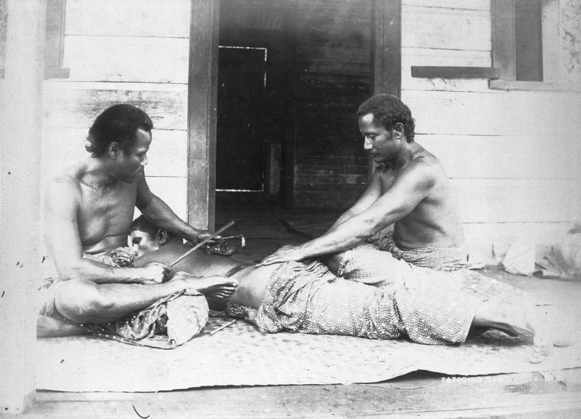 Samoan tatau - tattooing circa 1895 - photo Thomas Andrew — Samoan back tattoo by Thomas Andrew (1855-1939)